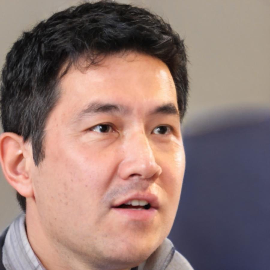 Experienced keyword research specialist reviewing system requirements